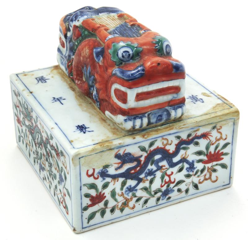 Chinese Qing porcelain seal,: Chinese Qing porcelain seal, having a double dragon handle to top, painted with five claw dragons on each side. With six character mark to top. PROVENANCE: From the Collection of Wei Yuan Hsueh and Em