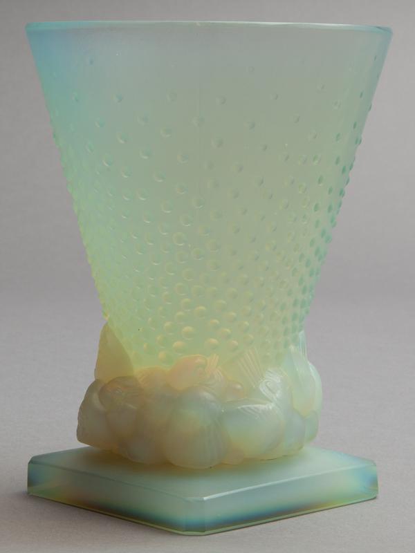 Sabino opalescent glass vase,: Sabino opalescent glass vase, of tapered form, decorated with molded beads and birds, raised on canted corner base. Underside marked, "Sabino France". 6.875"H,