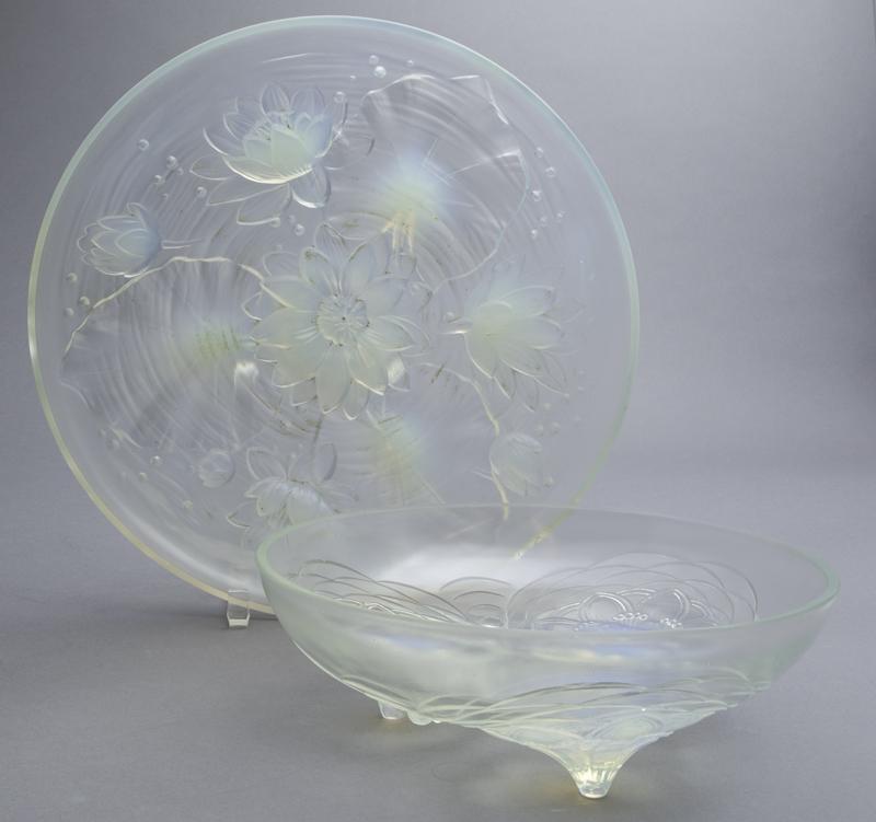 (2) French opalescent glass serving pieces,: (2) French opalescent glass serving pieces, (1) marked for Sabino and (1) unmarked. Each with molded water lily design. Larger: 2.75"H x 14" Dia.,