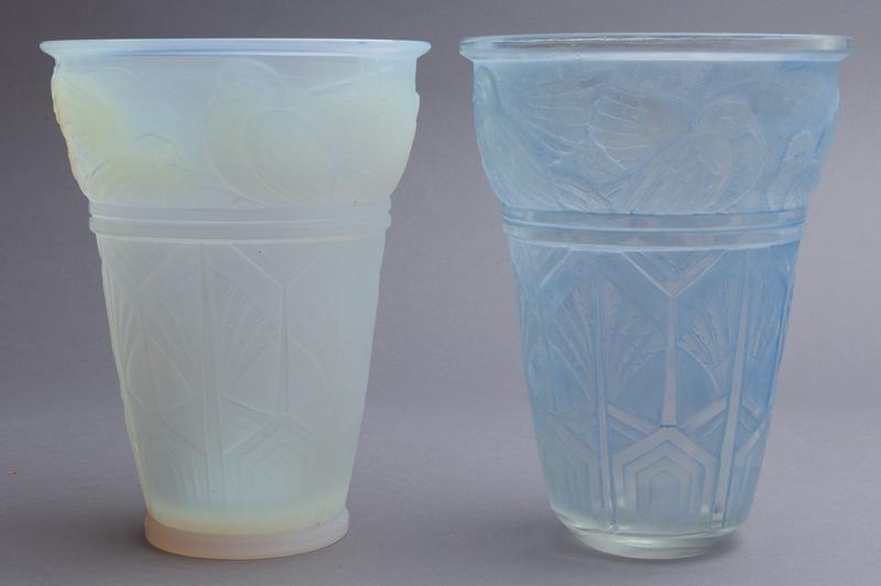 (2) Sabino Art Deco "Colombes" vases,: (2) Sabino Art Deco "Colombes" vases, having molded doves over geometric design. Underside signed, "Sabino France". 8.5"H x 6.5" Dia.,