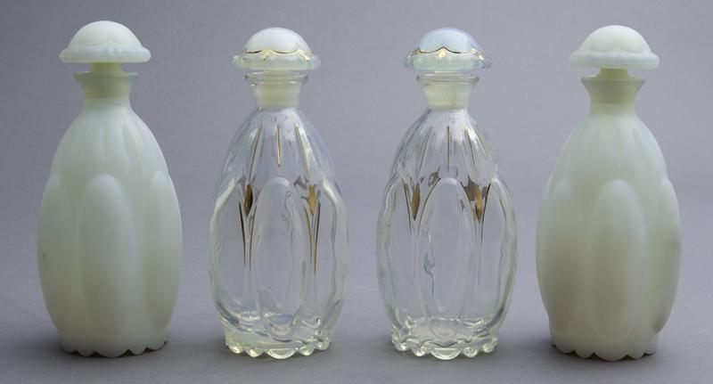 (4) French glass perfumes,: (4) French glass perfumes, (2) opalescent and (2) clear with gilt accents. Unsigned. Attributed to Sabino. 6.5"H,