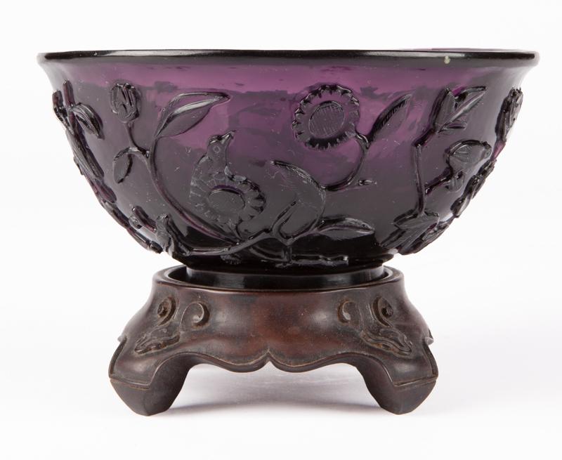 Chinese Qing peking glass bowl,: Chinese Qing peking glass bowl, carved to depict a bird and flower, raised on a hardwood stand. PROVENANCE: From the Collection of Wei Yuan Hsueh and Emily Hsueh, Dallas, Texas. Owners of the former O