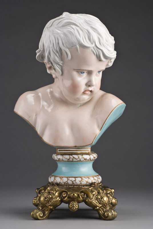 Meissen Marcolini period porcelain child's bust,: "Kinderkopf", set on a conforming gilt metal base. Cross swords mark in blue under glaze, incised, "116". Overall 16"H, Circa - 1774-1814.