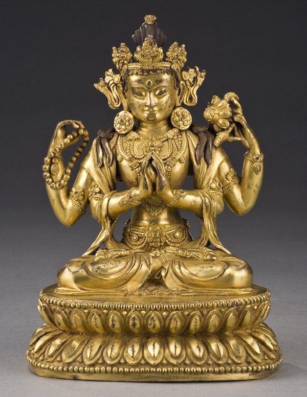 Chinese - Tibetan gilt bronze Amitayus Buddha: seated on a lotus throne, four hands holding Buddhist tokens. 8"H, Circa - 19th - 20th C.