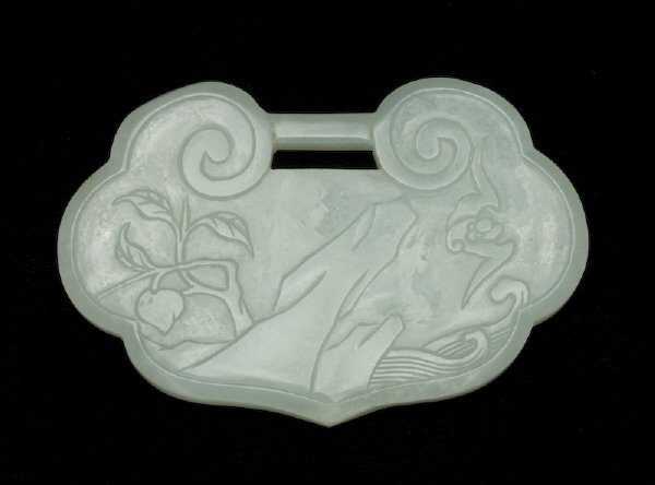 Chinese Qing carved jade lock depicting bats,: orchids and peaches. 2.25"H x 3.25"W, Circa - 19th C.