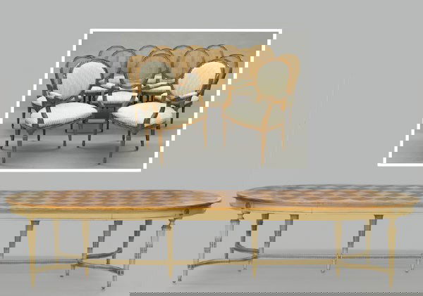 Large parquetry inlaid dining table and 12 chairs.: Table: 29.5"H x 44"W x 144"L; Arm chairs: 39.5"H x 25.5"W x 21.5"D; Side chairs: 37"H x 20"W x18"D. Circa - Mid. 20th C.