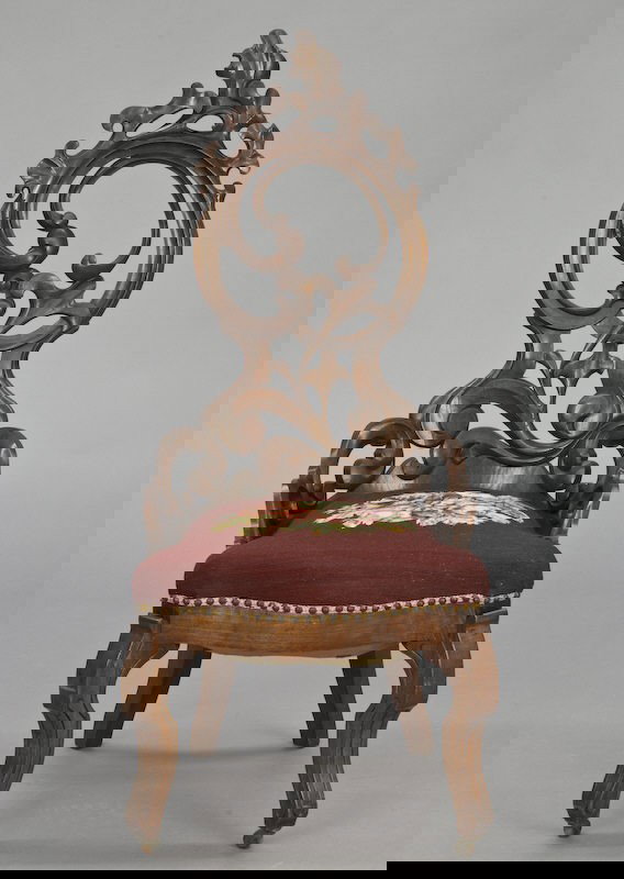 Gothic Revival side chair with needlepoint seat.: 45.5"H x 21"W x 20.5"D, Circa - Early 20th C.