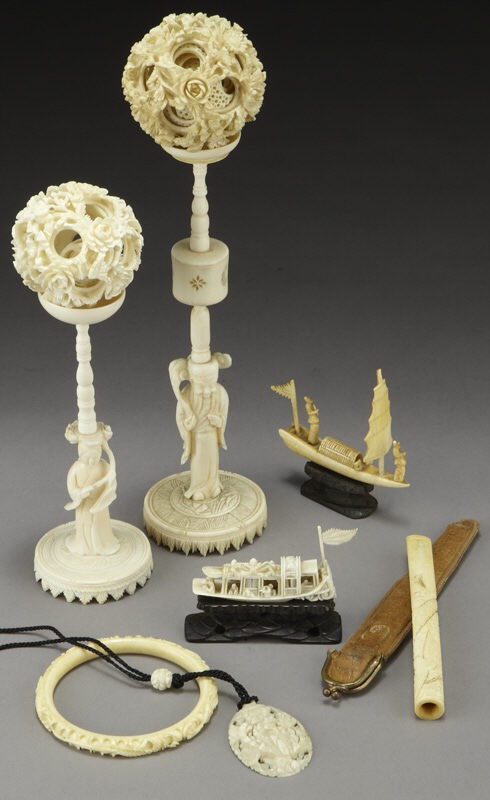 7 Pcs. Chinese carved ivory including: (2) puzzle: (International buyers should note that several countries do not allow the importation of lots containing materials made from endangered species. This includes, but is not limited to, ivory, coral and 