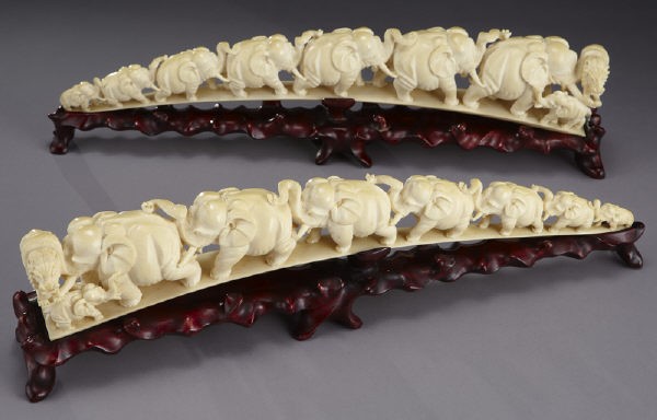 Pr. Chinese carved ivory tusks depicting eight: (International buyers should note that several countries do not allow the importation of lots containing materials made from endangered species. This includes, but is not limited to, ivory, coral and 