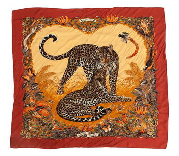 Hermes "Jungle Love" silk scarf: Hermes "Jungle Love" silk scarf with polychrome motif within burnt orange border, designed by Robert Dallet. 36" Sq.,