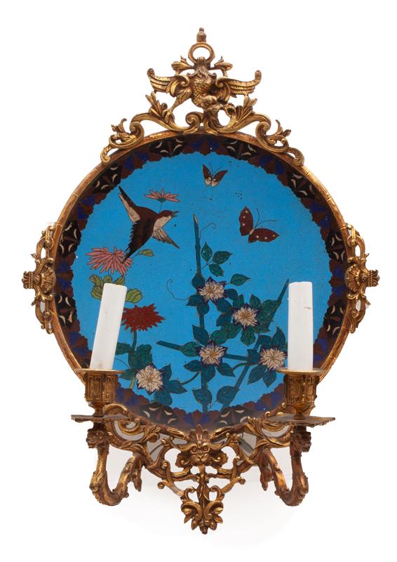 Cloisonne charger mounted as wall sconce: Cloisonne charger mounted as wall sconce in gilt metal frame. Decorated with a bird, butterflies and flowers. 20"H x 14"W x 6"D, Circa - 1890.