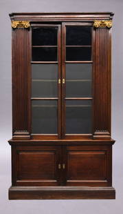 Rare George II mahogany architectural bookcase: Rare George II mahogany architectural bookcase with parcel gilt fluted pilasters, attributed to William Kent. PROVENANCE: From the Estate of Elizabeth Boone Gertz, Dallas, Texas. From the Collection