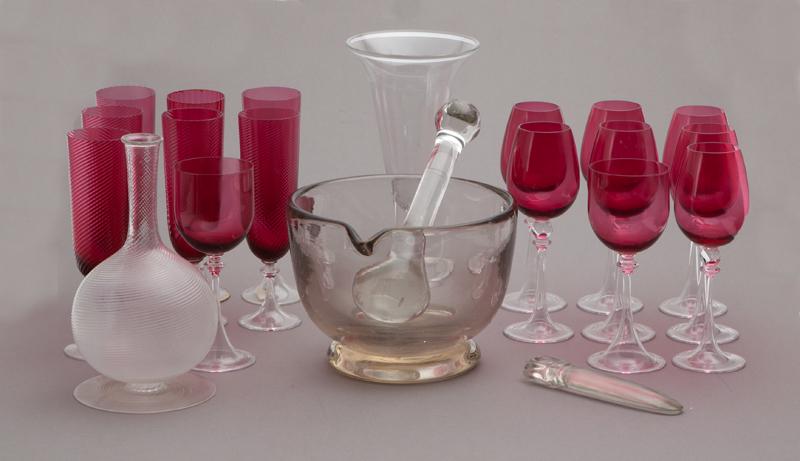 (20) Glass table articles,: (20) Glass table articles, including: (1) large glass mortar and pestle; (1) clear glass trumpet vase; (1) Italian swirl pattern vase; (16) cranberry glass wine glasses; (1) glass Aztec style knife. P