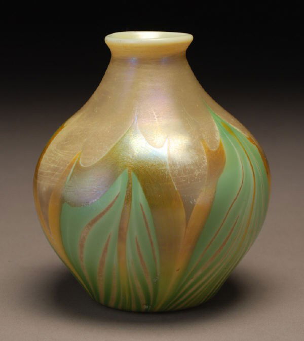 Early Tiffany Corona vase,: Early Tiffany Corona vase, gourd form in opal glass decorated with wide green leaves tipped in gold, typical caramel finish, unsigned, 5" H x 4" Dia. Circa - 1900.