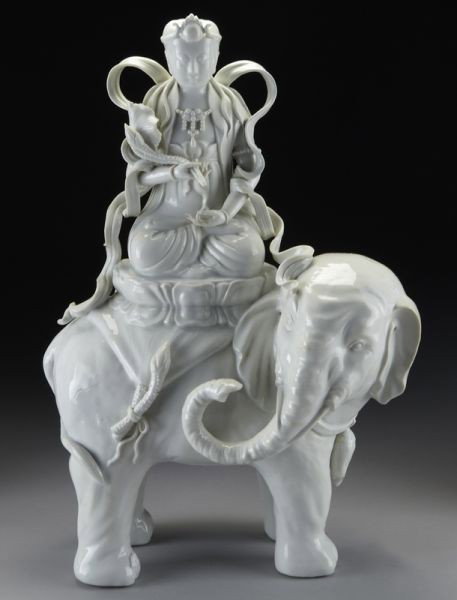 Chinese Qing blanc de chine porcelain Pu Xian Bodhi: Chinese Qing blanc de chine porcelain Pu Xian Bodhisattva seated on an elephant, hands in Buddhist mudra. 16.25"H x 11.5"W, Circa - 19th C.