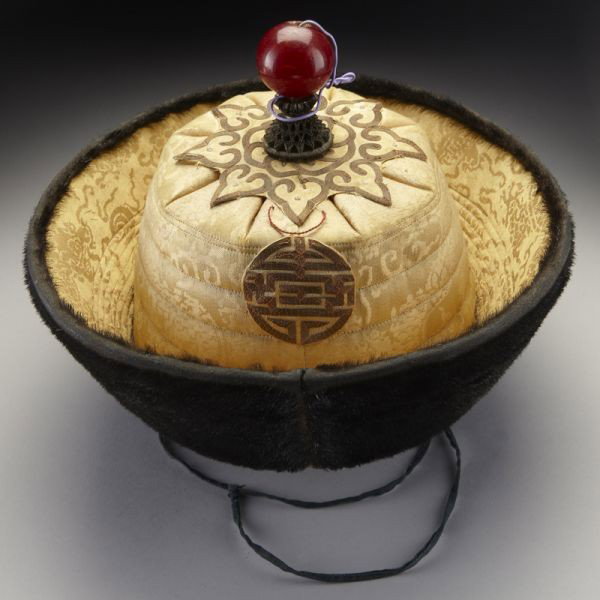 Chinese Qing prince's winter court hat having impe: Chinese Qing prince's winter court hat having imperial yellow silk on the top, mink fur on the sides and a red amber bead on the top. 6"H x 10" Dia., Circa - 18th - 19th C.