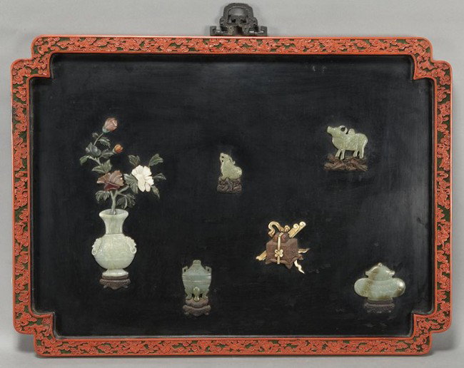 Chinese jade mounted cinnabar screen depicting vas: Chinese jade mounted cinnabar screen depicting vases, censers and animals. 25.75"H x 35.5"W, Circa - Early 20th C.