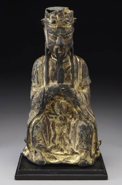Chinese Ming gold lacquered bronze figure depictin: Chinese Ming gold lacquered bronze figure depicting Wen Chang Di Jun holding a Hu board, seated on a stand. 13"H, Circa - 16th - 17th C.