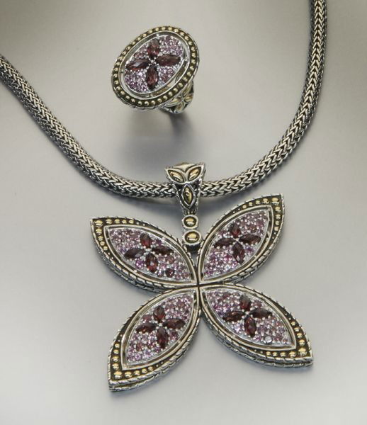 4 Pcs. 18K gold and sterling John Hardy Batu: pendant, chain and ring, mounted with faceted garnets and pink tourmalines. Bearing John Hardy mark and stamped, "18K 925". 80.4 grams. Ring size 7, chain 18", pendant 2.25" X 2". Circa - Late 20th C.