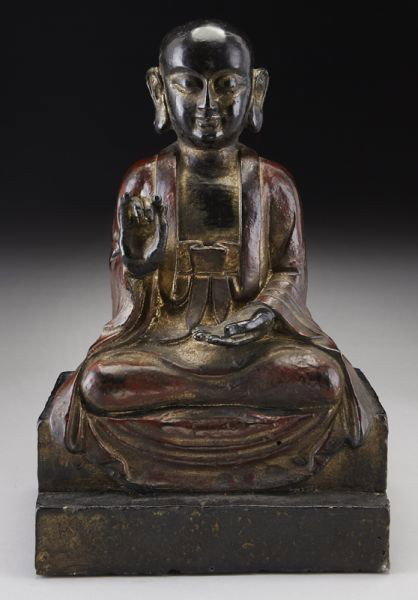 Chinese Ming gold lacquered Lohan,: hands in Buddhist Mudra, seated on a throne. 12.75"H, Circa - 16th - 17th C.