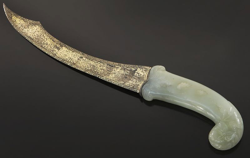 Mughal jade carved sword handle,: with a French blade. Jade: 4.75"L; Overall: 12.75"L, Circa - 18th C.
