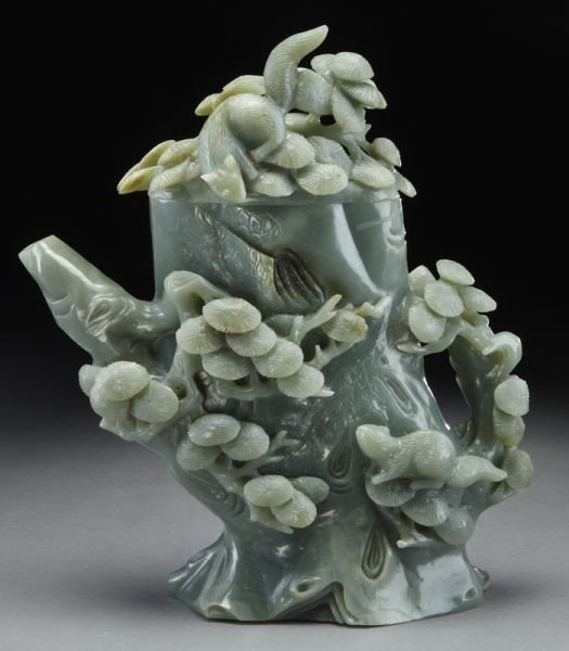 Chinese carved celadon jade tea pot: depicting pine trees and squirrels. 9.25"H, Circa - 20th C.