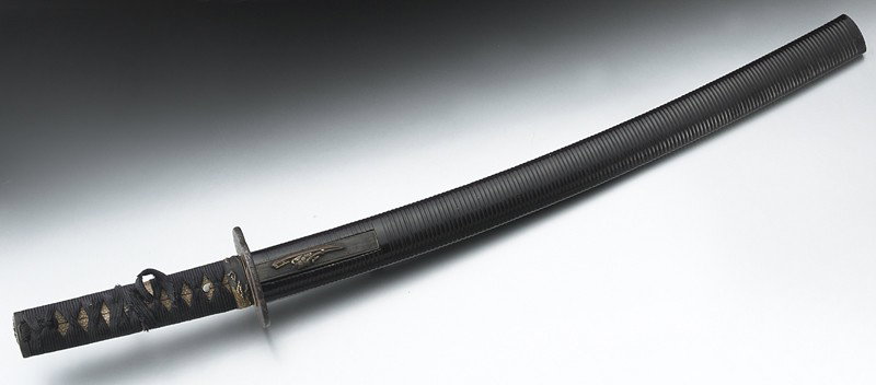 Japanese Wakazashi Samurai sword,: with a ribbed black lacquered sheath, mixed metal fitting and a throwing knife on the side. Blade: 24"L; Overall: 26"L, Circa - Meiji Period.