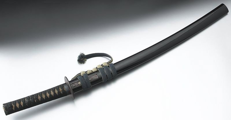 Japanese Katana sword,: with a black lacquered sheath, with a throwing knife on the side. Blade: 28"L, Overall: 30.5"L, Circa - Meiji Period.