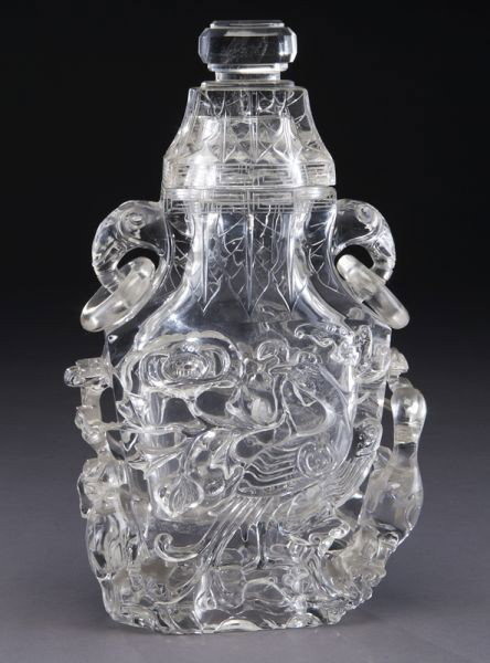 Chinese Qing carved rock crystal vase: depicting phoenix, peony, bats, pine trees and cranes. 12"H x 7.5"W, Circa - 19th C.