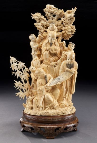 Chinese carved ivory figural group: (International buyers should note that several countries do not allow the importation of lots containing materials made from endangered species. This includes, but is not limited to, ivory, coral and 