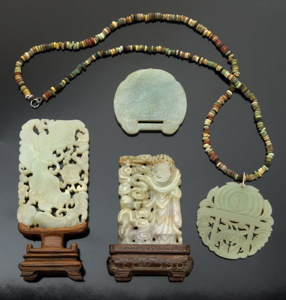 (4) Chinese carved jade and jadeite plaques,: depicting figures, butterflies and flowers. Largest: 3.5"H x 2"W, Circa - 19th C.