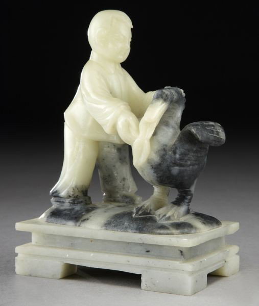 Chinese Cultural Revolution soapstone carving: depicting a boy feeding a duck. 5"H, Circa - 1960.