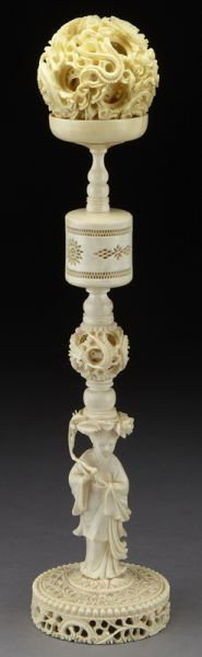 Chinese carved ivory puzzle ball: (International buyers should note that several countries do not allow the importation of lots containing materials made from endangered species. This includes, but is not limited to, ivory, coral and 