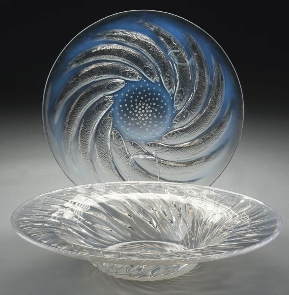 (2) R. Lalique opalescent glass pieces, including: (1) "Algues" bowl having a swirling wheat design; M. #10-390, P. 308; and (1) "Poissons" plate decorated with twelve fish spiraling toward the center; M. #3056, P. 707. Stenciled and acid etched signa