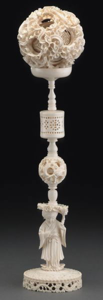 Chinese carved ivory puzzle ball: (International buyers should note that several countries do not allow the importation of lots containing materials made from endangered species. This includes, but is not limited to, ivory, coral and