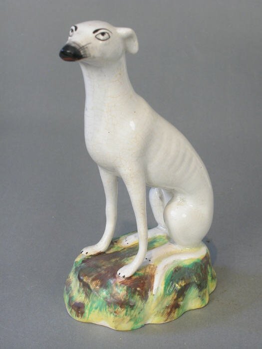Staffordshire greyhound figure. 7 3/4"H