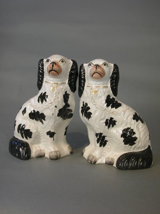 Pair of Disrali Staffordshire spaniels,