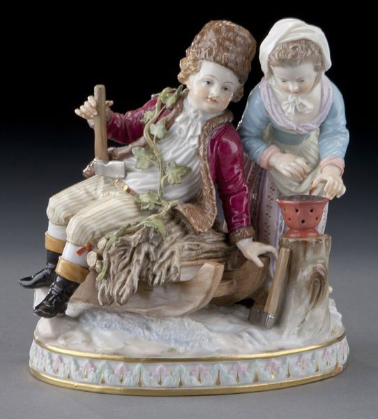 Meissen figural group emblematic of "Winter",: Meissen figural group emblematic of "Winter", modeled as a woodcutter seated on a sled, by a girl warming her hands over a brazier, on a gilt trimmed oval base. Cross swords mark in blue under glaze,