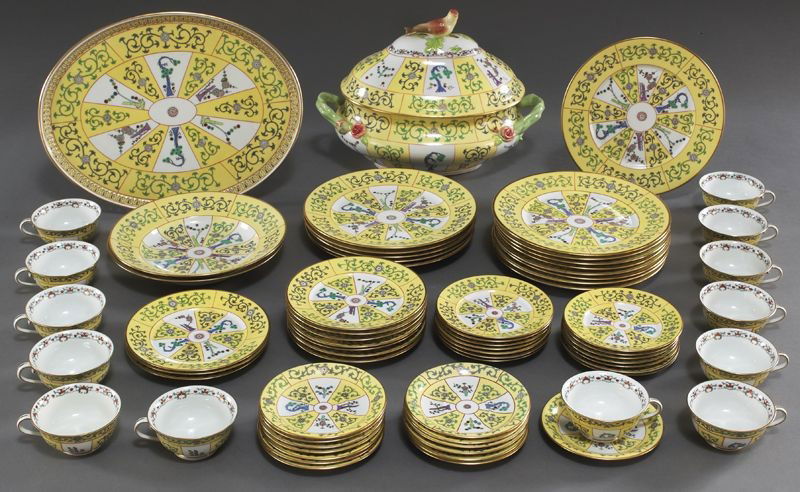 69 Pcs. Herend "Yellow Dynasty" partial dinner: 69 Pcs. Herend "Yellow Dynasty" partial dinner service decorated with chinoiserie foliage on a yellow ground, including: (14) dinner plates; (10) dessert plates; (2) soup bowls; (13) tea cups; (28) sa