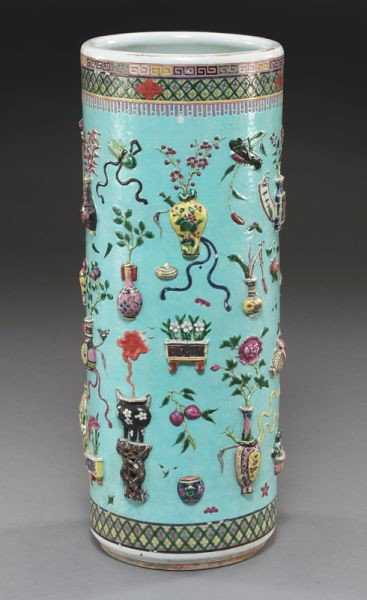 Chinese porcelain umbrella stand: Chinese porcelain umbrella stand having a turquoise ground decorated in high relief with lucky symbols. 24''H x 9.25'' Dia., Circa - 1900.