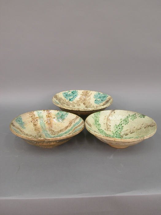 Five French pottery bowls, all worn from - 2