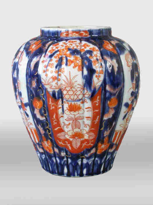 Imari vase with ribbed body. 8 3/4"H x 4