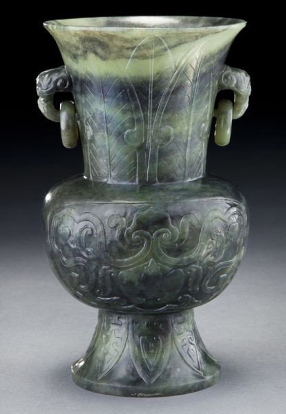 Chinese carved jade vase: Chinese carved jade vase depicting bats, peaches and lingzhi. 7.5"H, Circa - 19th - 20th C.