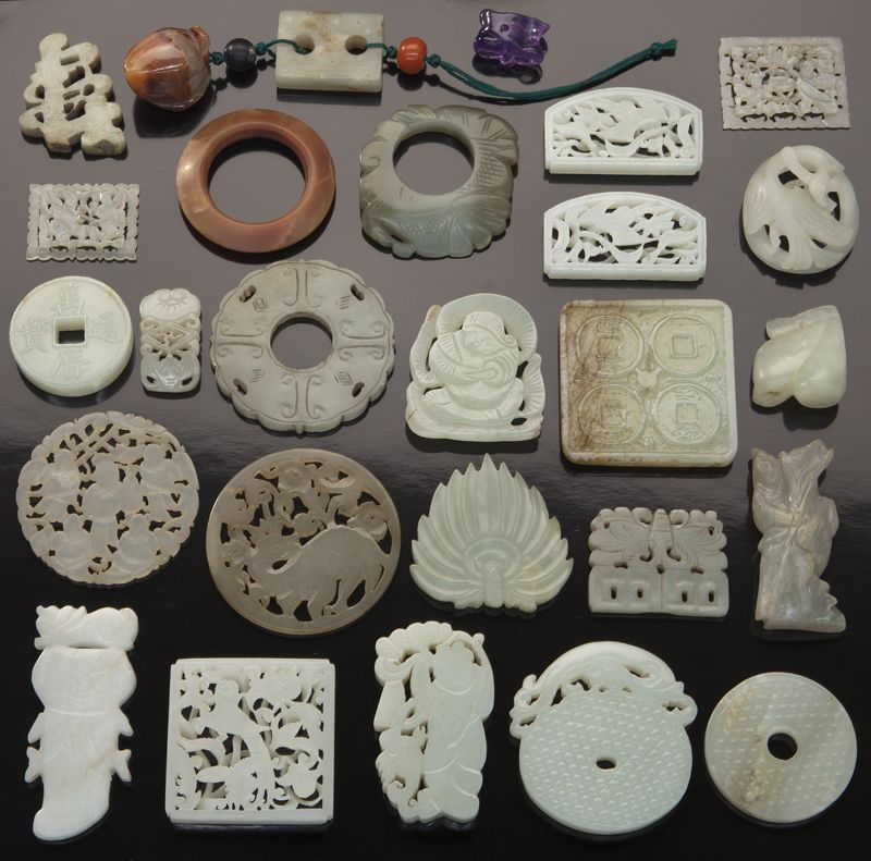 (26) Chinese Ming-20th C. carved jade pendants: (26) Chinese Ming-20th C. carved jade pendants depicting flowers, animals, bi-disks and assorted animals. Ranging from 1.5"H - 2.5"H, Circa - 17th - 20th C.