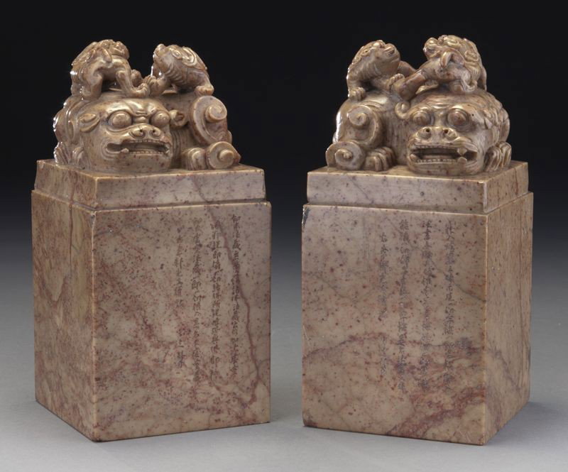 Pr. large Japanese Yoshida Hanu soapstone: Pr. large Japanese Yoshida Hanu soapstone seals, carved to depict foo dogs. 9"H x 4.25" Sq., Circa - 19th C.