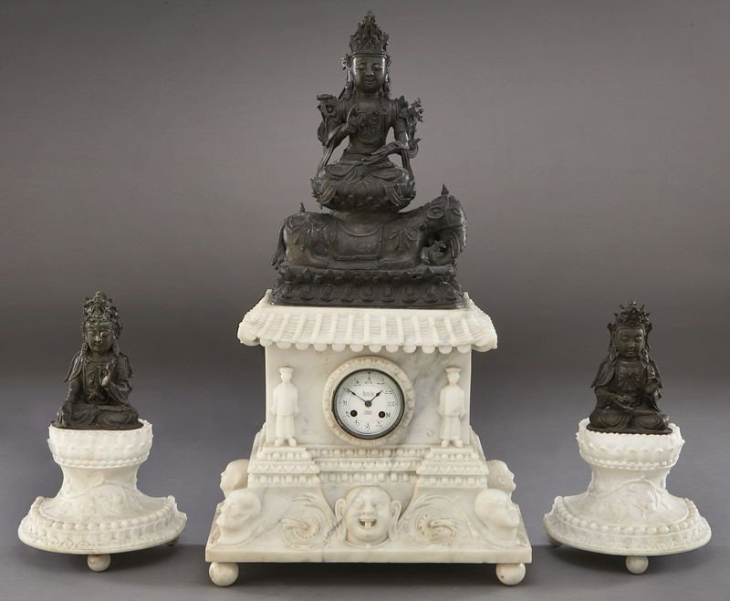 (3) Chinese Qing bronze Buddhas,: (3) Chinese Qing bronze Buddhas, mounted as a 3pc. marble garniture, the central figure's base fitted with a French clock movement. Smaller bronzes: 7.5"H; Large bronze: 15"H; Overall: 29.5"H, Circa -