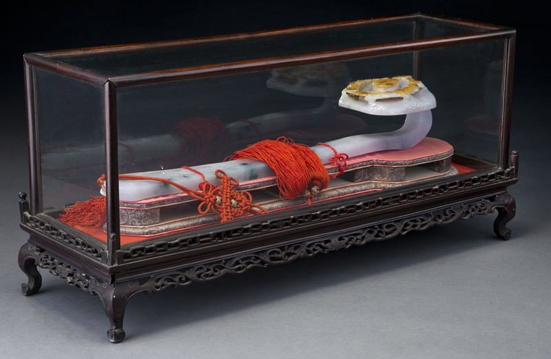 Chinese Qing carved jadeite ruyi scepter,: Chinese Qing carved jade ruyi scepter, depicting five bats and longevity characters, with a finely carved guava handle. Jade: 15.5"L; Box: 7"H x 19.75"W x 6"D, Circa - 19th C.