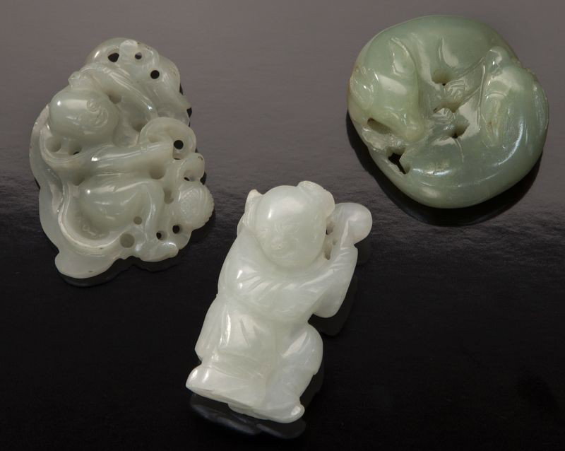 (3) Chinese Qing carved jade toggles: (3) Chinese Qing carved jade toggles depicting boys and double badgers. Largest: 2"H, Circa - 18th - 19th C.
