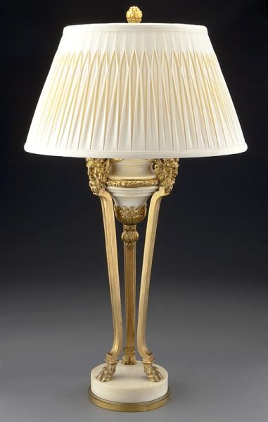 Louis XVI style bronze and Carrara marble lamp,: Louis XVI style bronze and Carrara marble lamp, the marble urn ringed in gilt bronze garland and suspending acanthus leaves and berries, raised by tripod legs mounted with grotesque masks and terminat