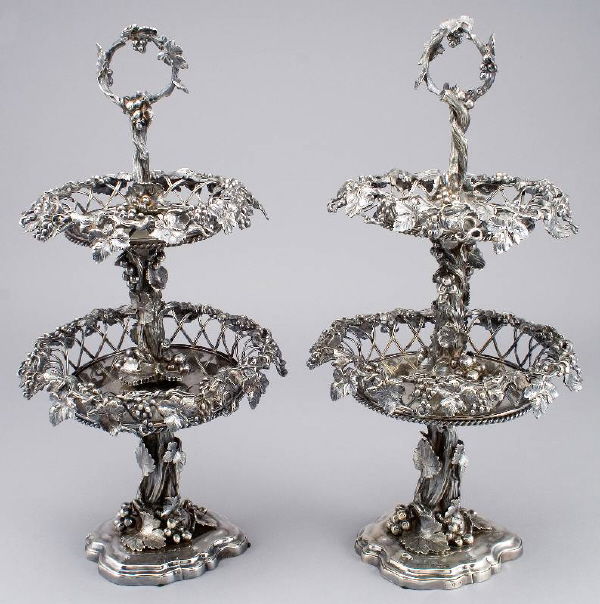 Pr. Elkington & Co.silverplate epergnes, two tiered: Pr. Elkington & Co.silverplate epergnes, two tiered, with ornate grapevine decoration. The central column is in the form of a heavy twisted vine, marked "E & Co" on side of base along with a "K." 20"H